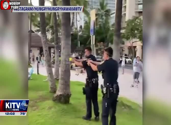 Video :After being spotted playing about on a bench, an elderly pervert brandishes a knife at onlookers